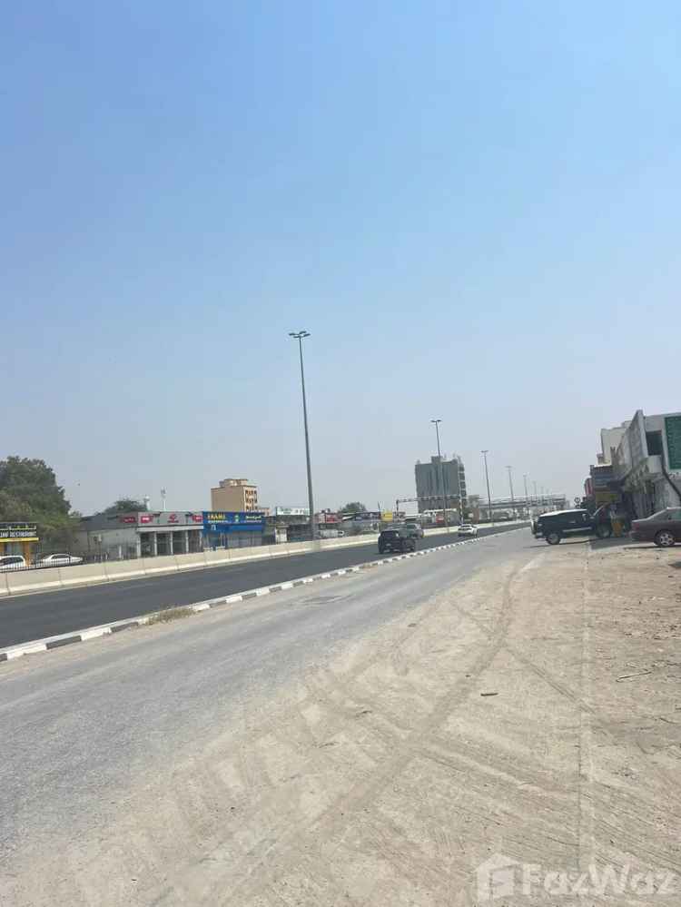 Residential and commercial land for sale in Ras Al Khaimah, directly on Amman Street