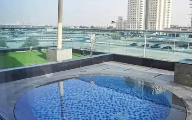 Buy Studio Apartment in Majan with Pool, Gym, and Balcony